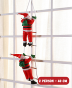 Climbing Ladder Santa Ornament
