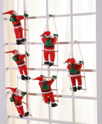 Climbing Ladder Santa Ornament