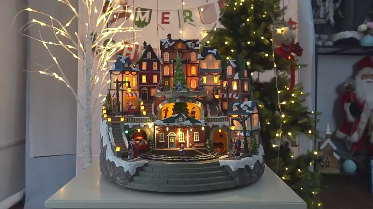 Luminous LED Christmas Train in City Lights